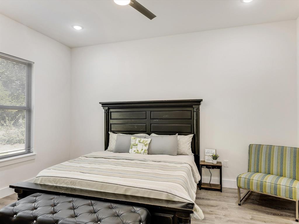 6123 Inca Drive Mabank, TX 75156 - Photo 25 of 31 a bedroom with a bed and a couch