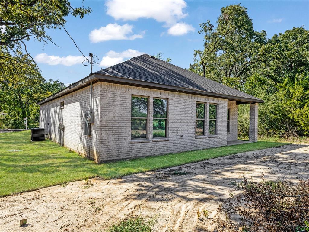 6123 Inca Drive Mabank, TX 75156 - Photo 28 of 31 a view of a house with a yard