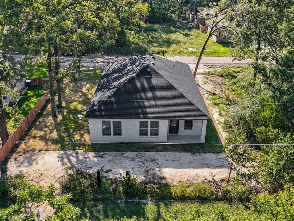 6123 Inca Drive Mabank, TX 75156 - Photo 30 of 31 a house view with a garden space