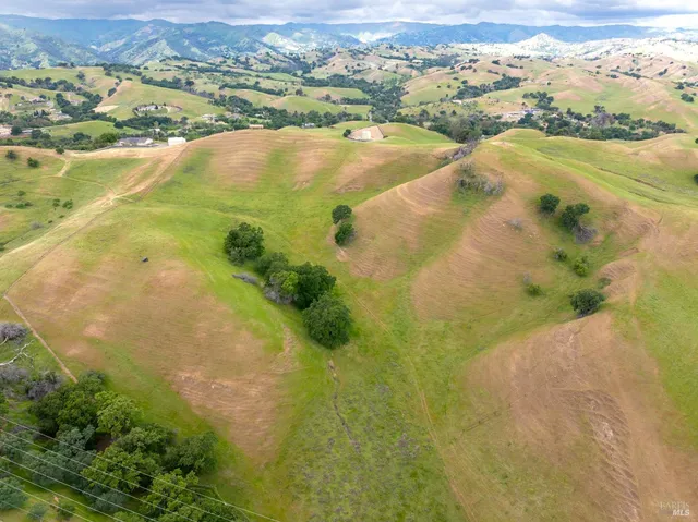 an aerial view of ocean with residential house and ocean view