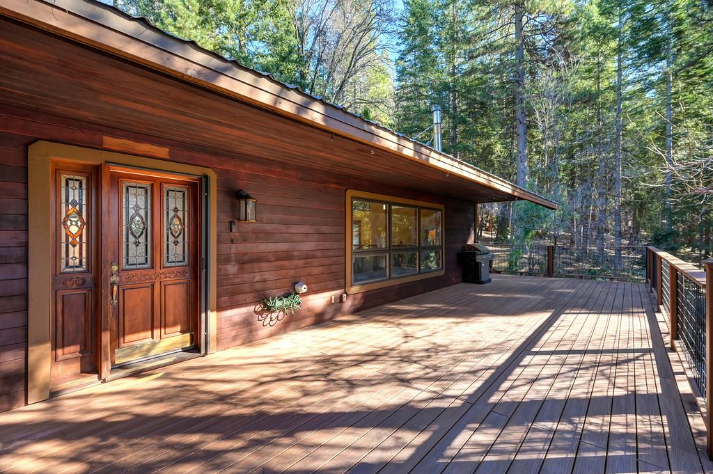 575 Frost Hill Road Alta, CA 95701 - Photo 5 of 82 Front of this beautiful custom home with a wrap around deck has a great additional feature the extended eves which works great year around. The inside front of the home is the Living Room.