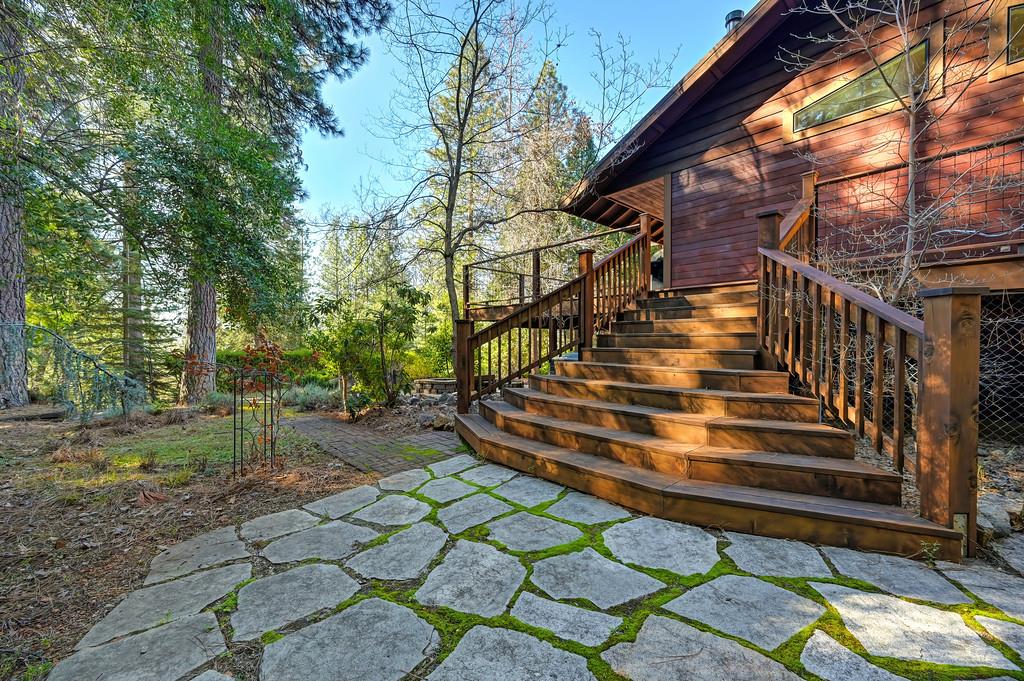 575 Frost Hill Road Alta, CA 95701 - Photo 61 of 82 Steps up to wrap around deck and looking towards the front of the home