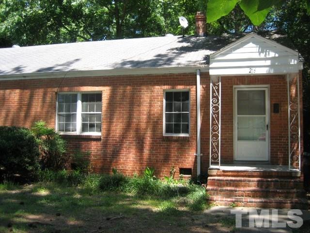 216 Colleton Road Raleigh, NC 27610 - Photo 1 of 11 a front view of a house with garden