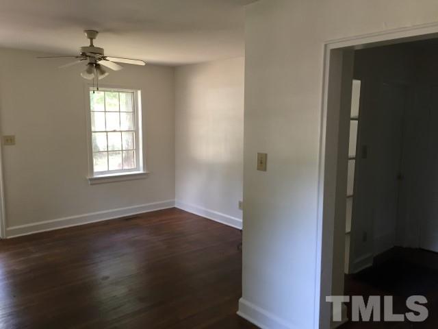 216 Colleton Road Raleigh, NC 27610 - Photo 6 of 11 an empty room that has a window