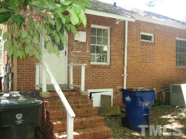 216 Colleton Road Raleigh, NC 27610 - Photo 10 of 11 a view of a patio with table and chairs