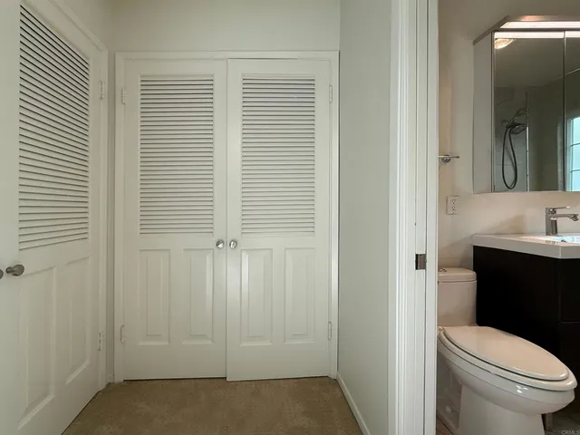 a bathroom with a sink and toilet