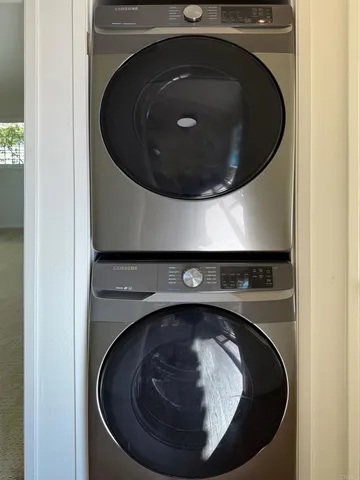 a utility room with washing machine