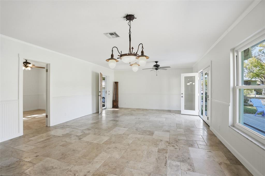 5995 South Shadytree Path Homosassa, FL 34448 - Photo 29 of 64 a view of a chandelier fan and windows in a room