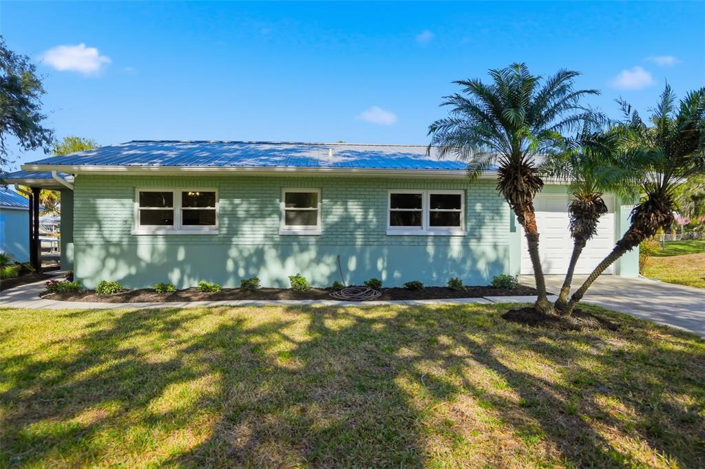 5995 South Shadytree Path Homosassa, FL 34448 - Photo 43 of 64 a view of a house with a yard