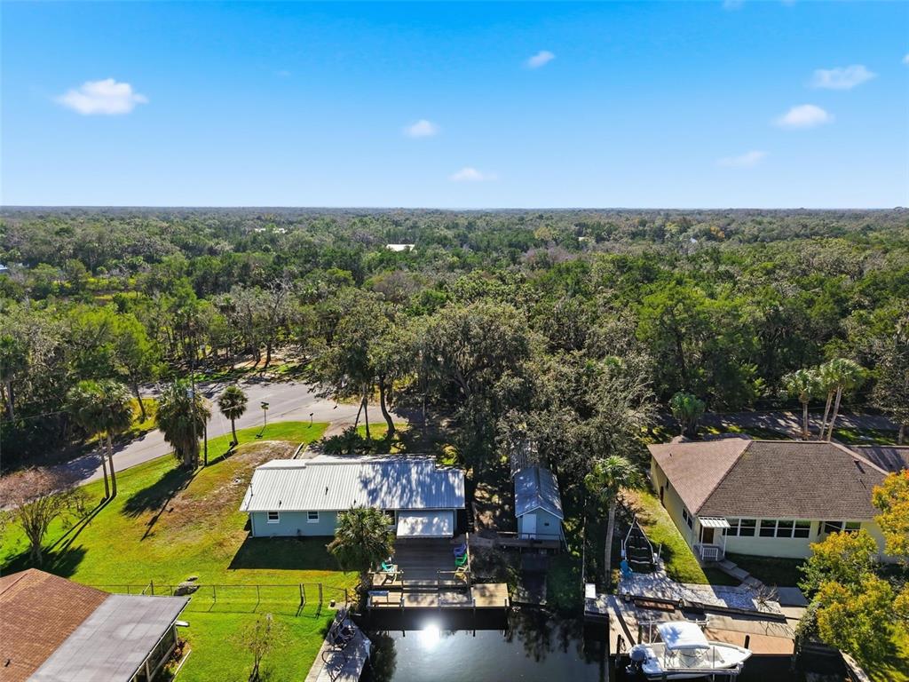 5995 South Shadytree Path Homosassa, FL 34448 - Photo 52 of 64 an aerial view of a house with a garden