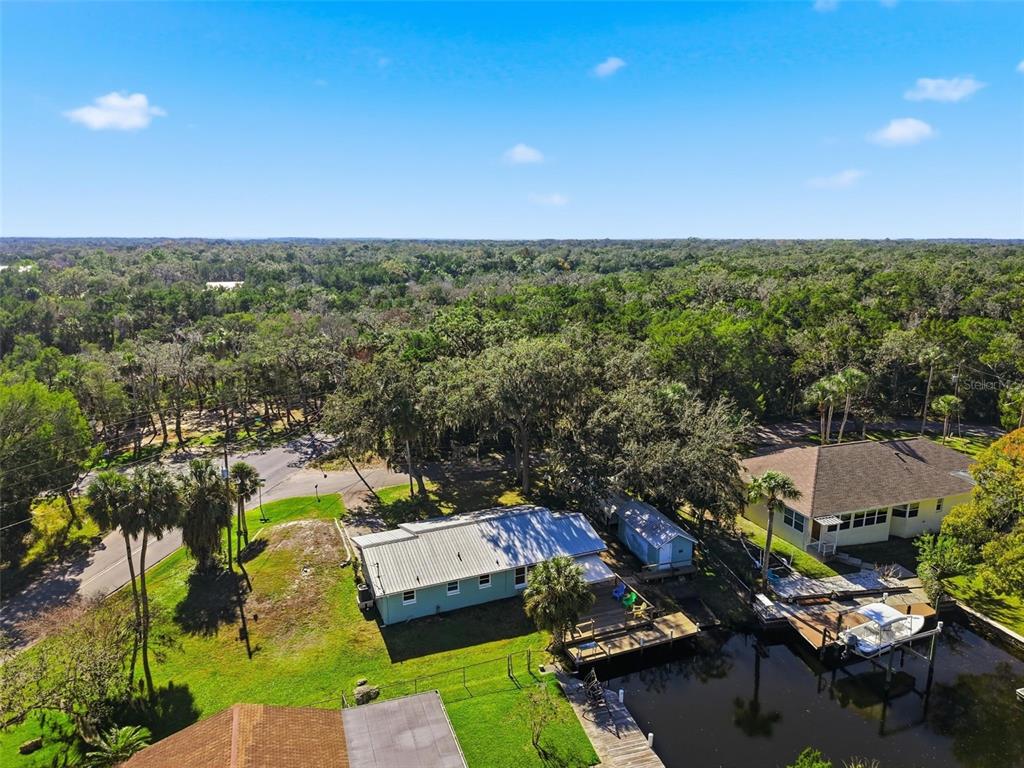 5995 South Shadytree Path Homosassa, FL 34448 - Photo 61 of 64 an aerial view of a houses with yard