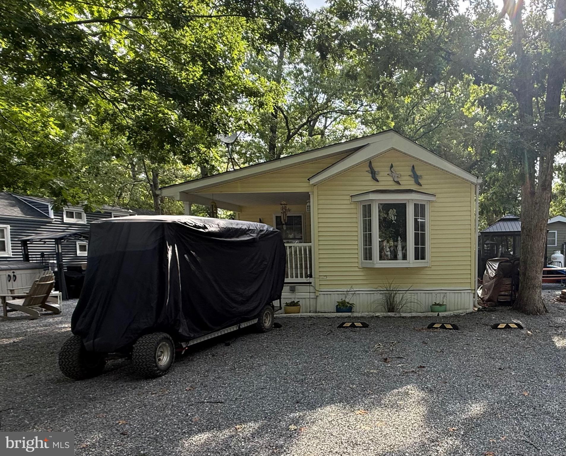 515 Corsons Tavern Road, Unit E48 Ocean View, NJ 08230 - Photo 1 of 26 E-48 with golf cart