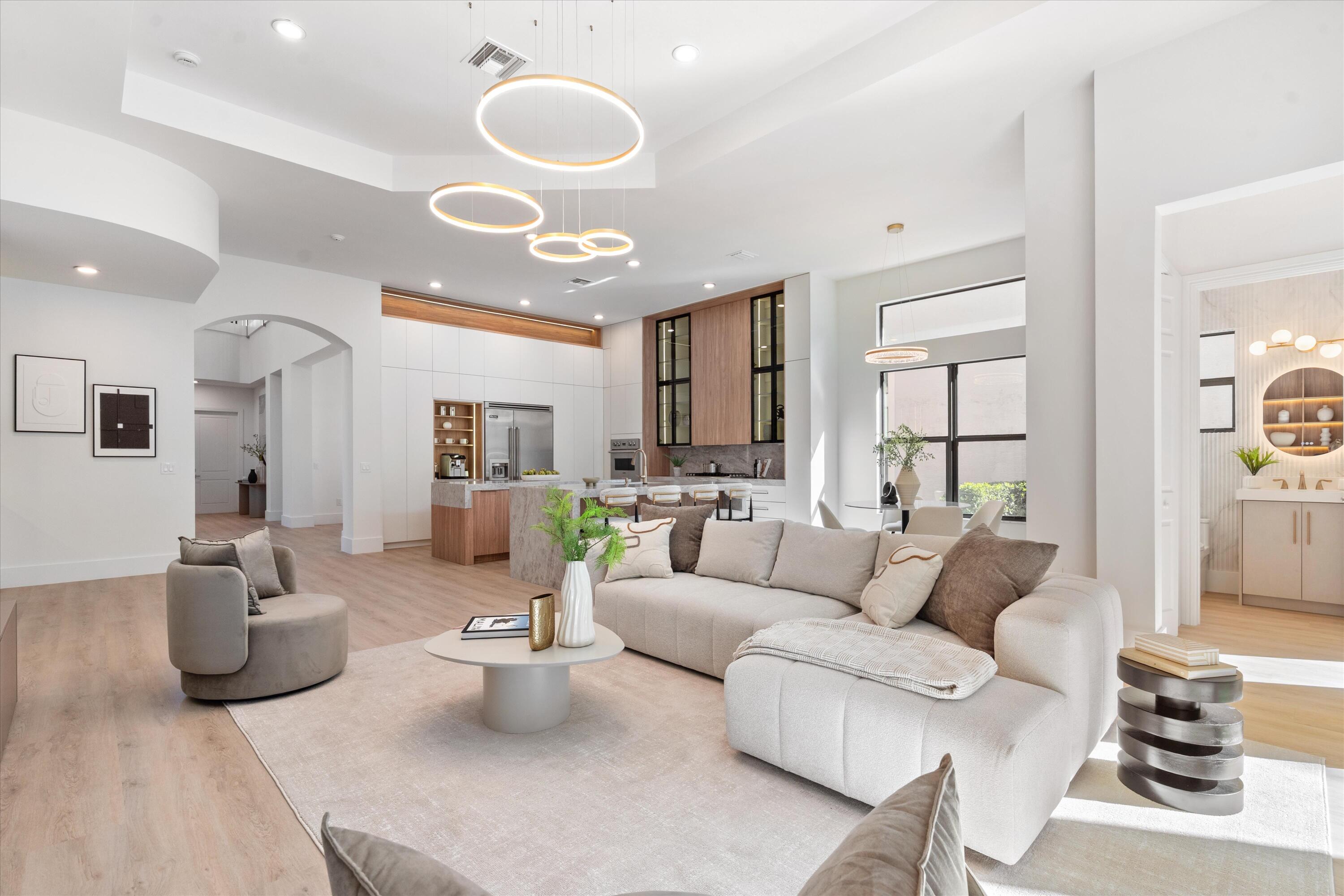 8749 Lewis River Road Delray Beach, FL 33446 - Photo 17 of 32 a living room with furniture and a large window