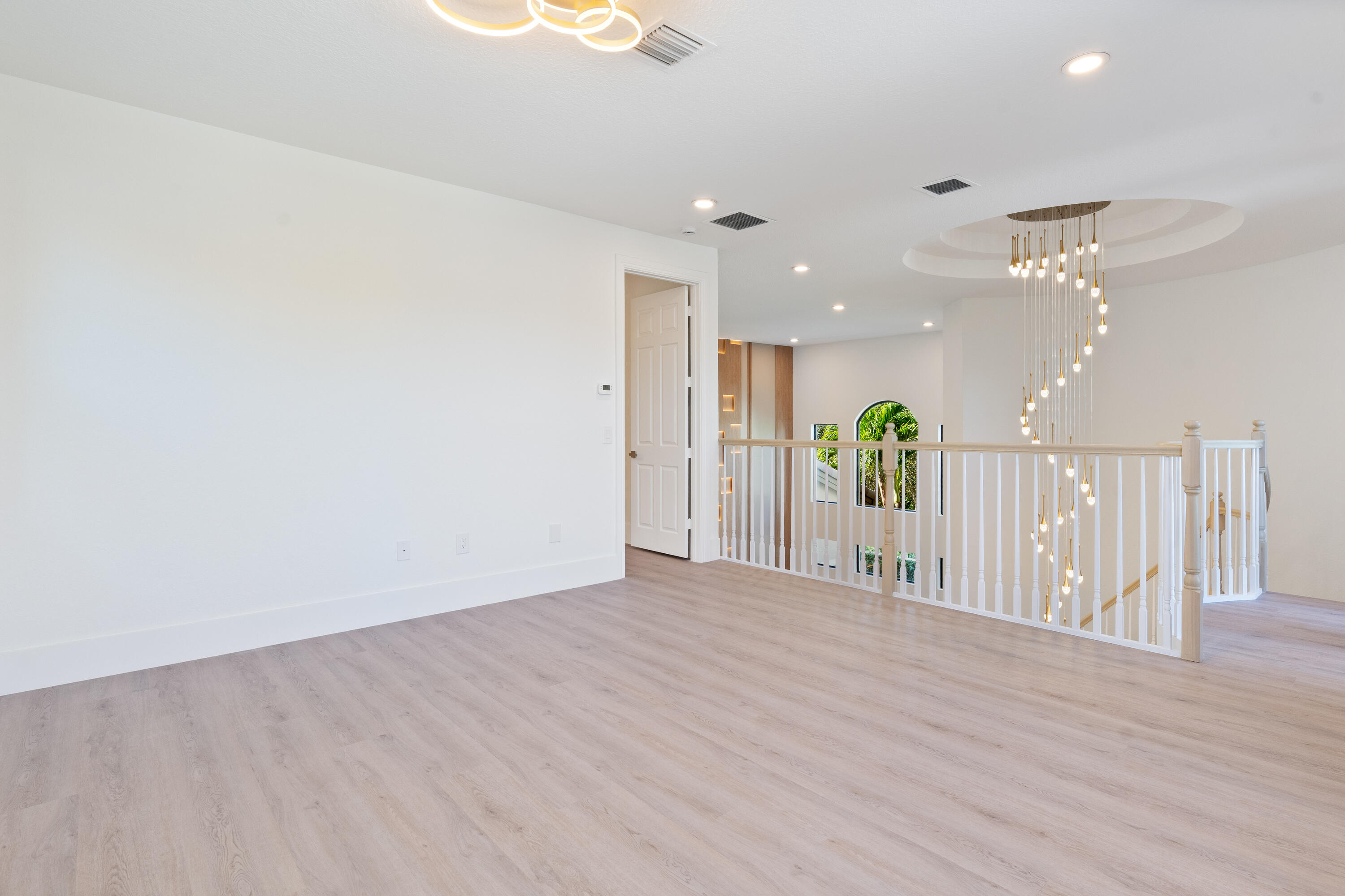 8749 Lewis River Road Delray Beach, FL 33446 - Photo 24 of 32 a view of a livingroom with wooden floor