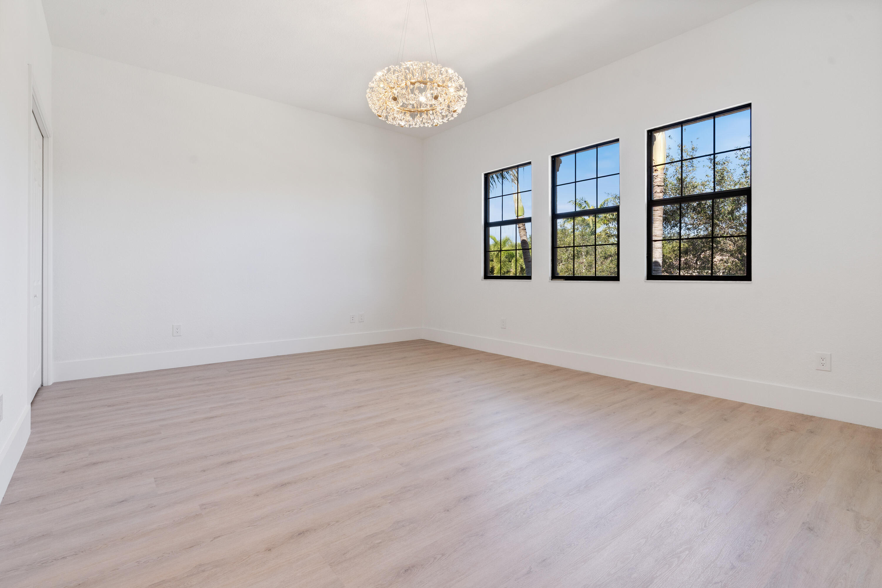 8749 Lewis River Road Delray Beach, FL 33446 - Photo 25 of 32 an empty room with windows