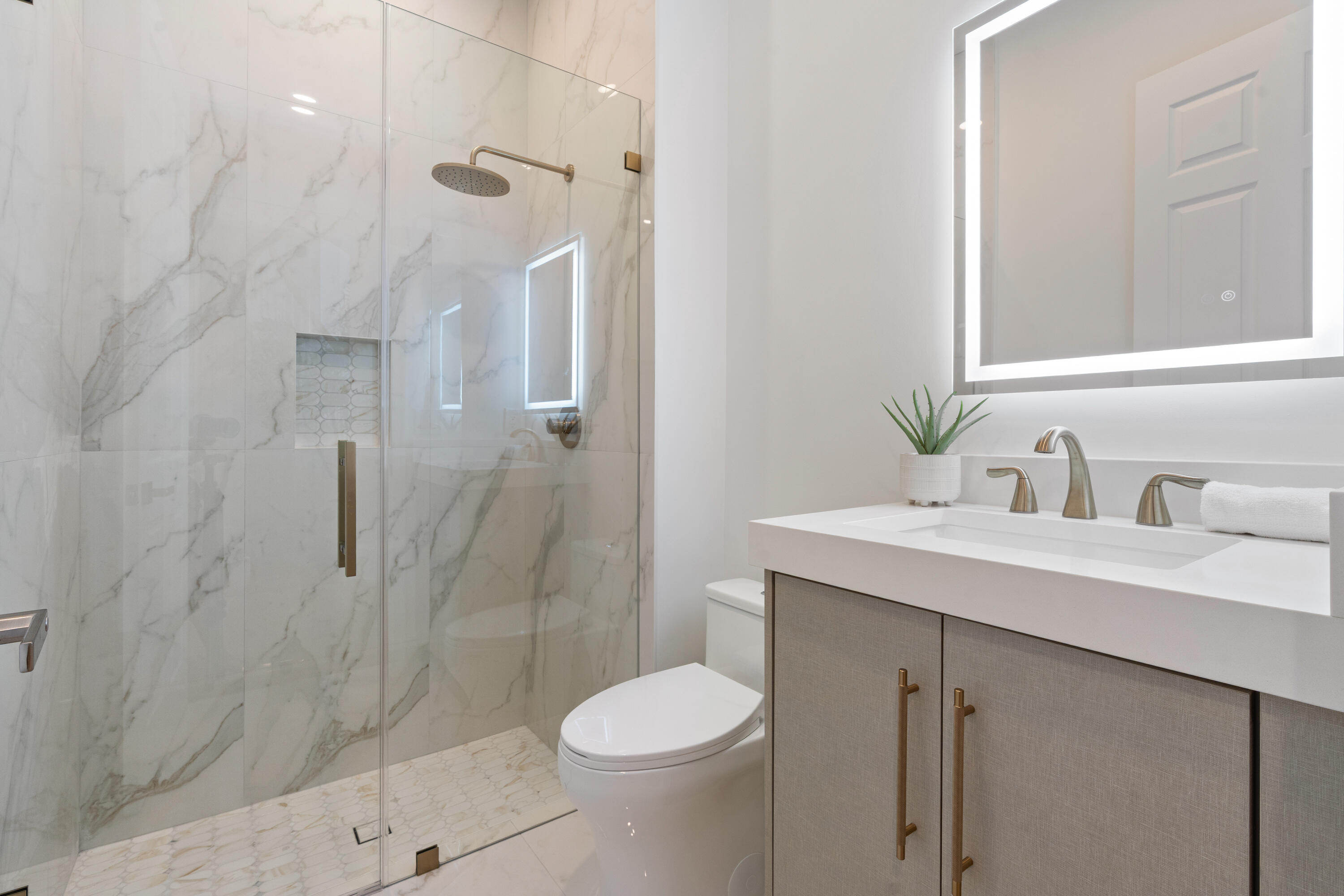 8749 Lewis River Road Delray Beach, FL 33446 - Photo 26 of 32 a bathroom with a sink toilet and shower