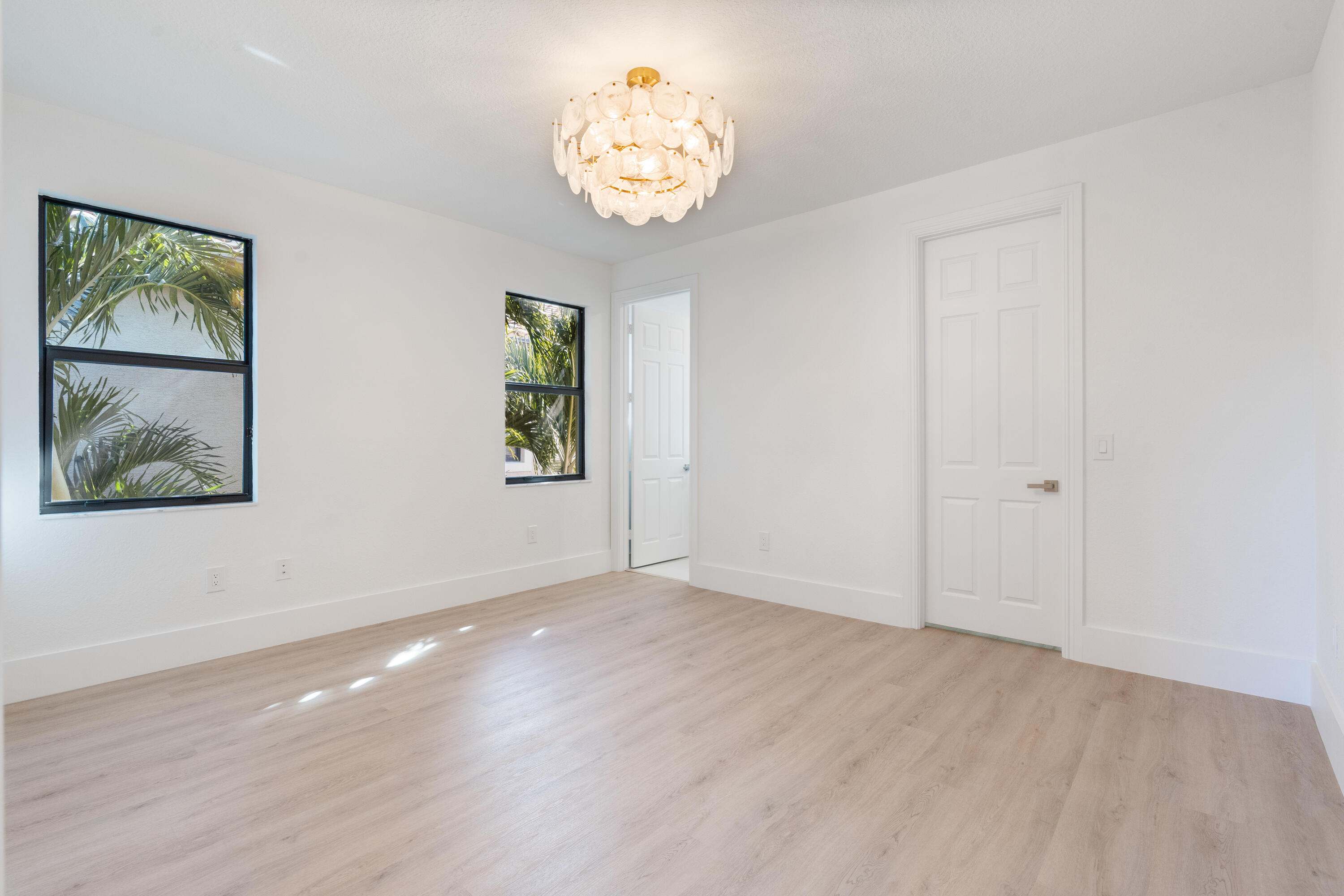 8749 Lewis River Road Delray Beach, FL 33446 - Photo 27 of 32 a view of an empty room with a window