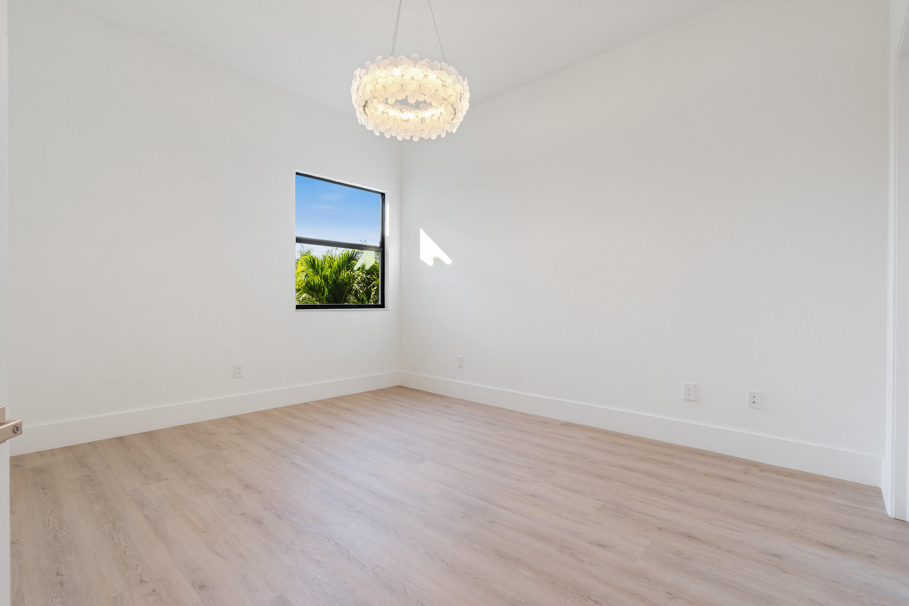 8749 Lewis River Road Delray Beach, FL 33446 - Photo 29 of 32 an empty room with a window