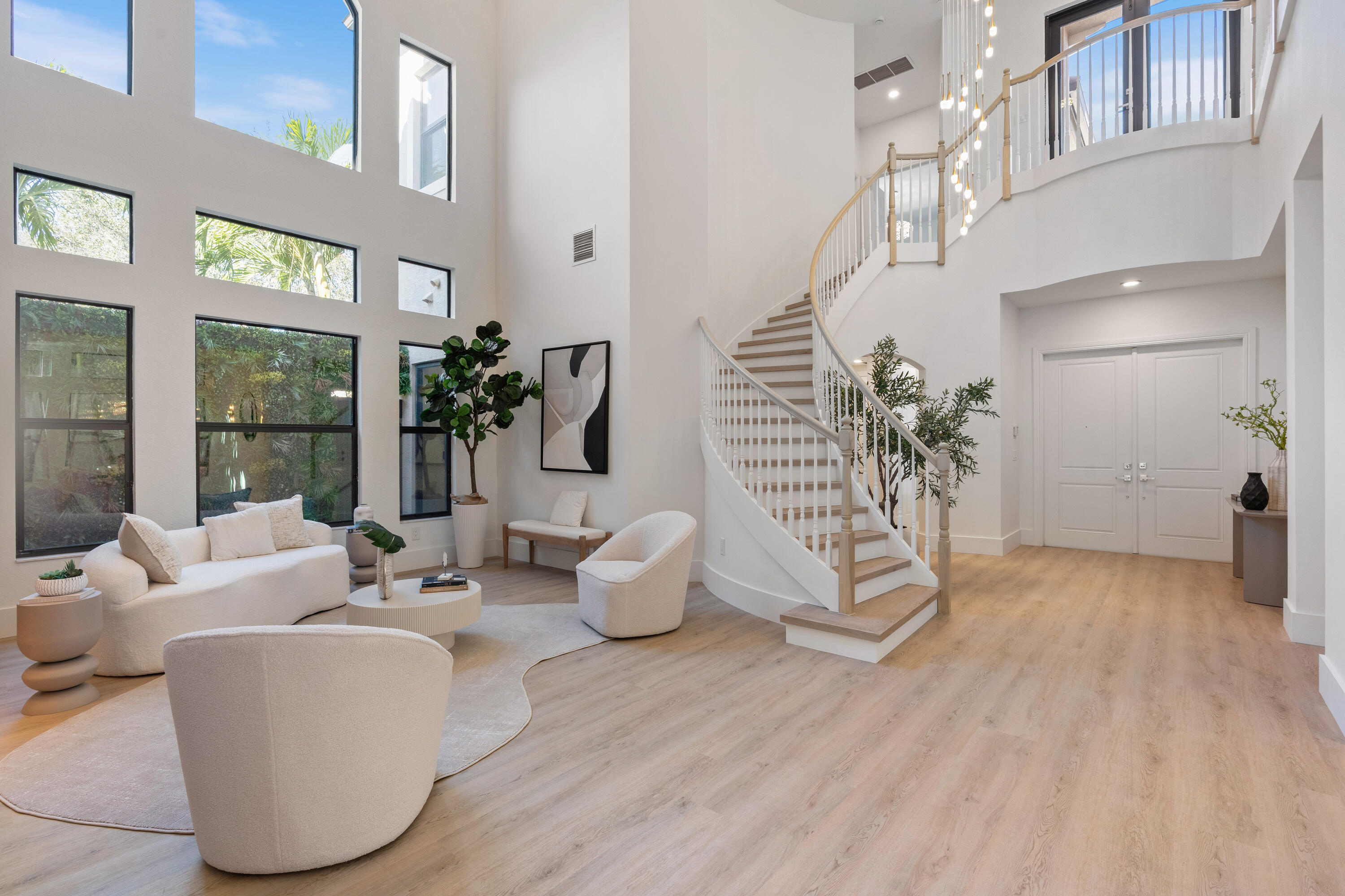 8749 Lewis River Road Delray Beach, FL 33446 - Photo 4 of 32 a living room with furniture and wooden floor