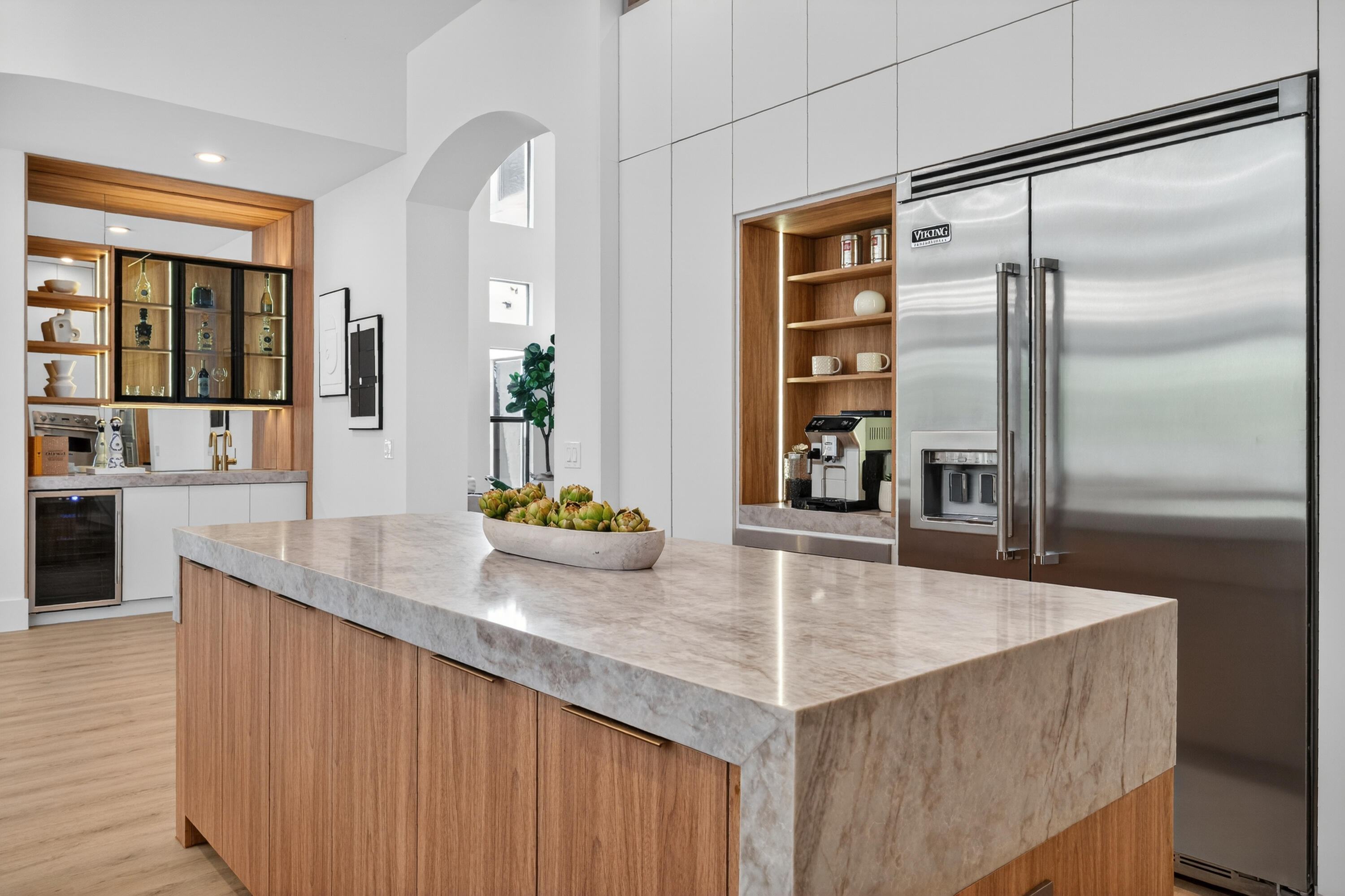 8749 Lewis River Road Delray Beach, FL 33446 - Photo 9 of 32 a kitchen with sink and refrigerator
