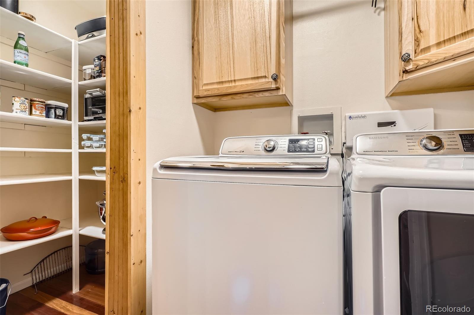 10439 Christopher Drive Conifer, CO 80433 - Photo 24 of 32 a utility room with dryer and washer