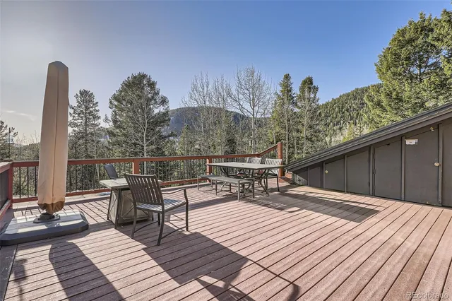 a outdoor space with lots of furniture and shower