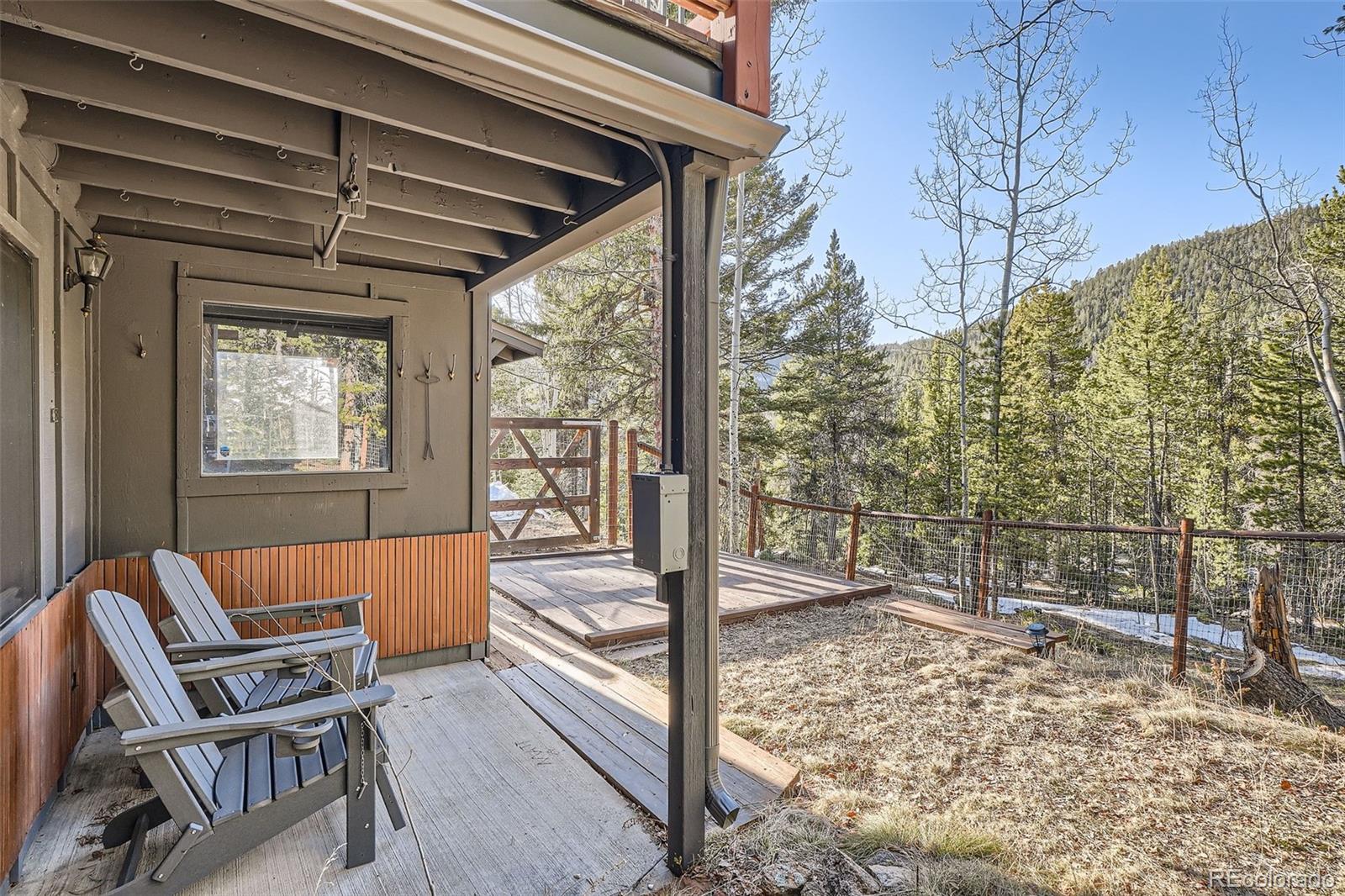 10439 Christopher Drive Conifer, CO 80433 - Photo 29 of 32 a outdoor space with lots of furniture and shower