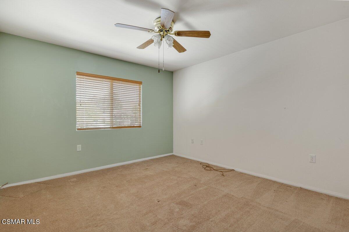 Undisclosed Address Simi Valley, CA 93063 - Photo 17 of 29 an empty room with a window and a ceiling fan