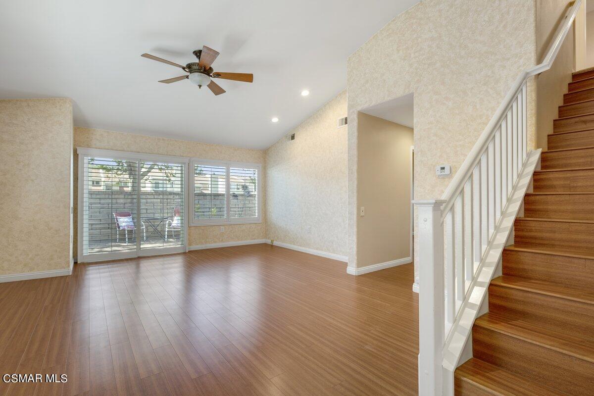 Undisclosed Address Simi Valley, CA 93063 - Photo 2 of 29 a view of an empty room with wooden floor and a window