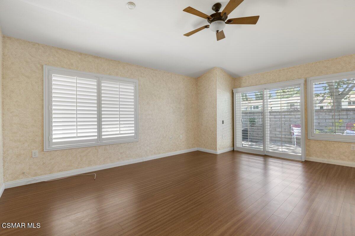 Undisclosed Address Simi Valley, CA 93063 - Photo 5 of 29 a view of an empty room with wooden floor and a window