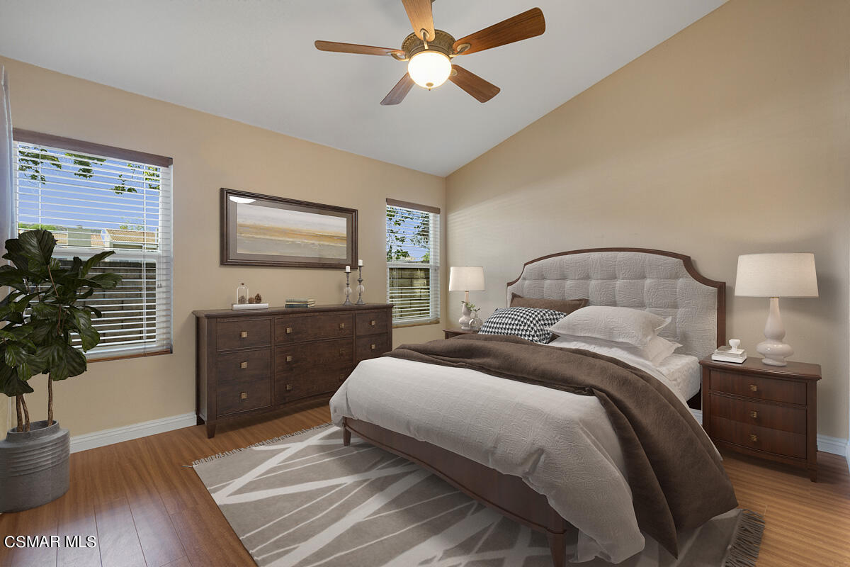 Undisclosed Address Simi Valley, CA 93063 - Photo 7 of 29 a bedroom with a bed and a chandelier