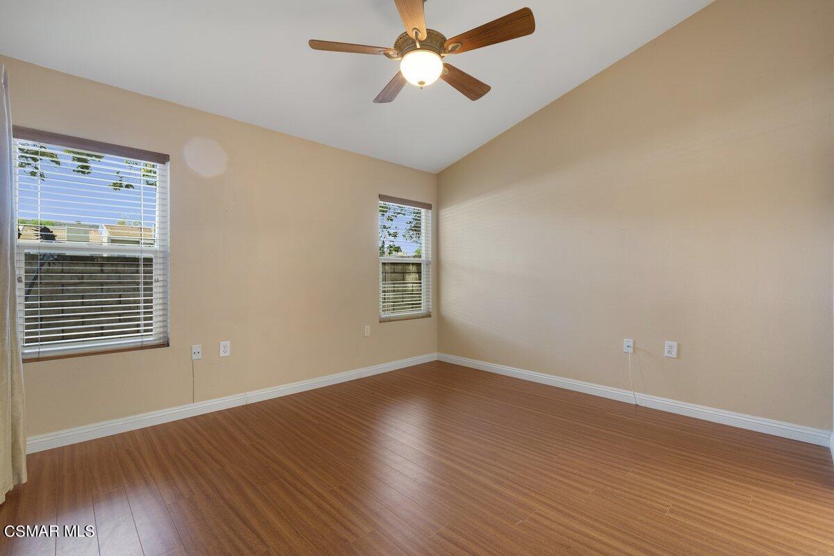 Undisclosed Address Simi Valley, CA 93063 - Photo 8 of 29 a view of empty room with wooden floor and fan