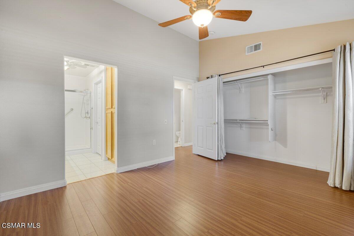 Undisclosed Address Simi Valley, CA 93063 - Photo 9 of 29 an empty room with wooden floor closet and windows