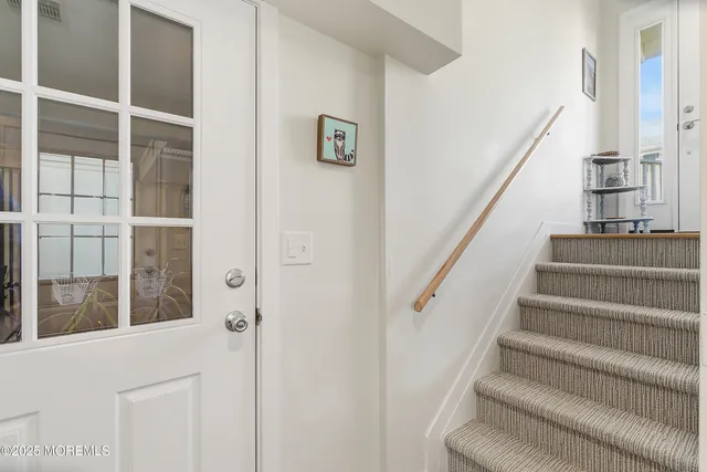 a view of a chair and table in the patio