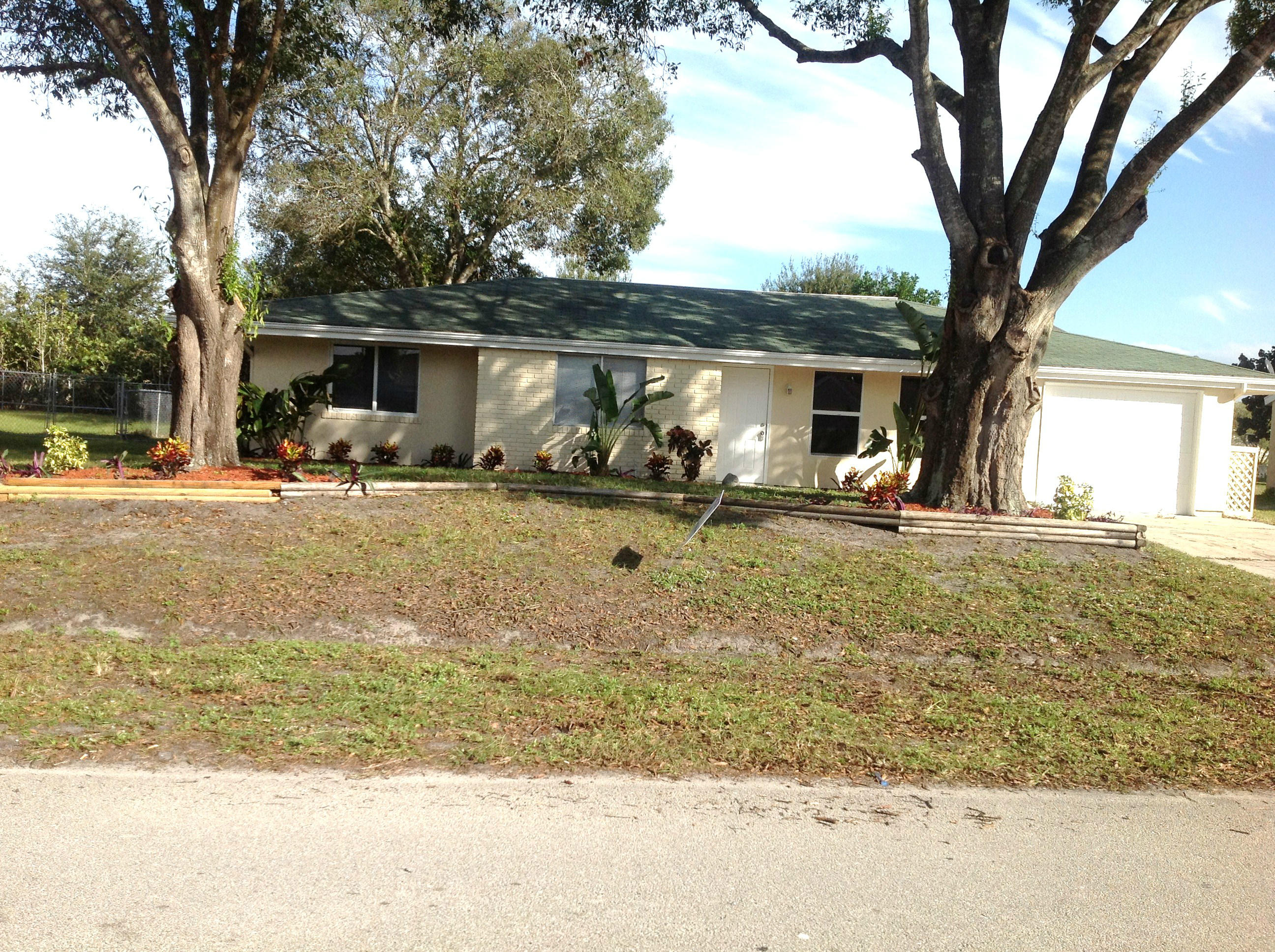 355 Southwest Cherryhill Road Port St. Lucie, FL 34953 - Photo 3 of 24 Front
