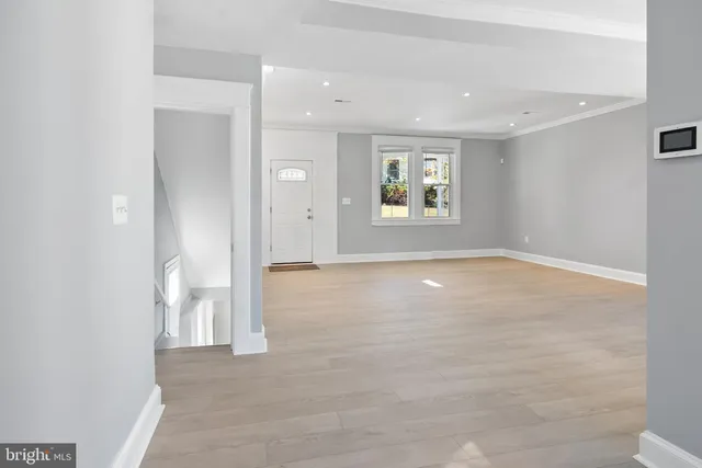 a kitchen with stainless steel appliances granite countertop a stove and a microwave