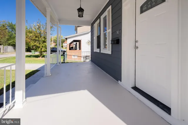 a view of staircase with white walls