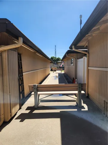 a view of a livingroom with furniture and windows