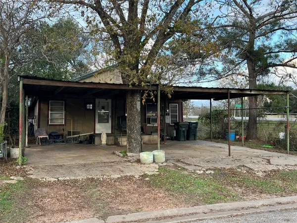 a front view of a house with a porch