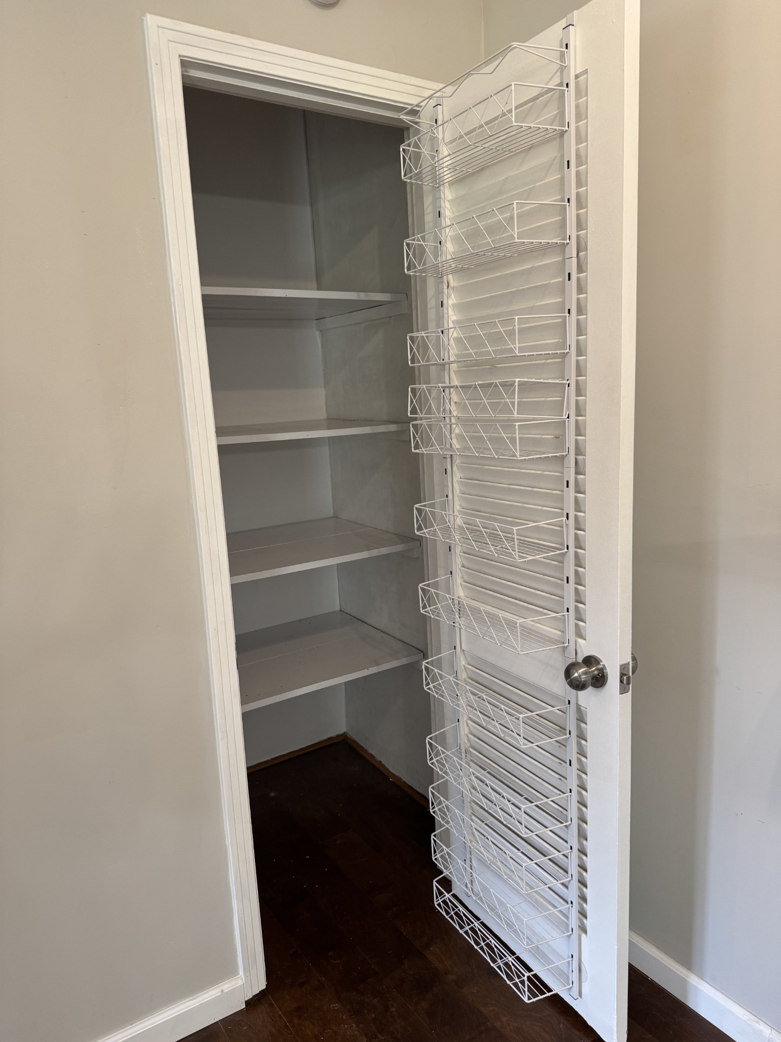 8298 Southfork Road Baxter, TN 38544 - Photo 17 of 49 a view of walk in closet with empty racks