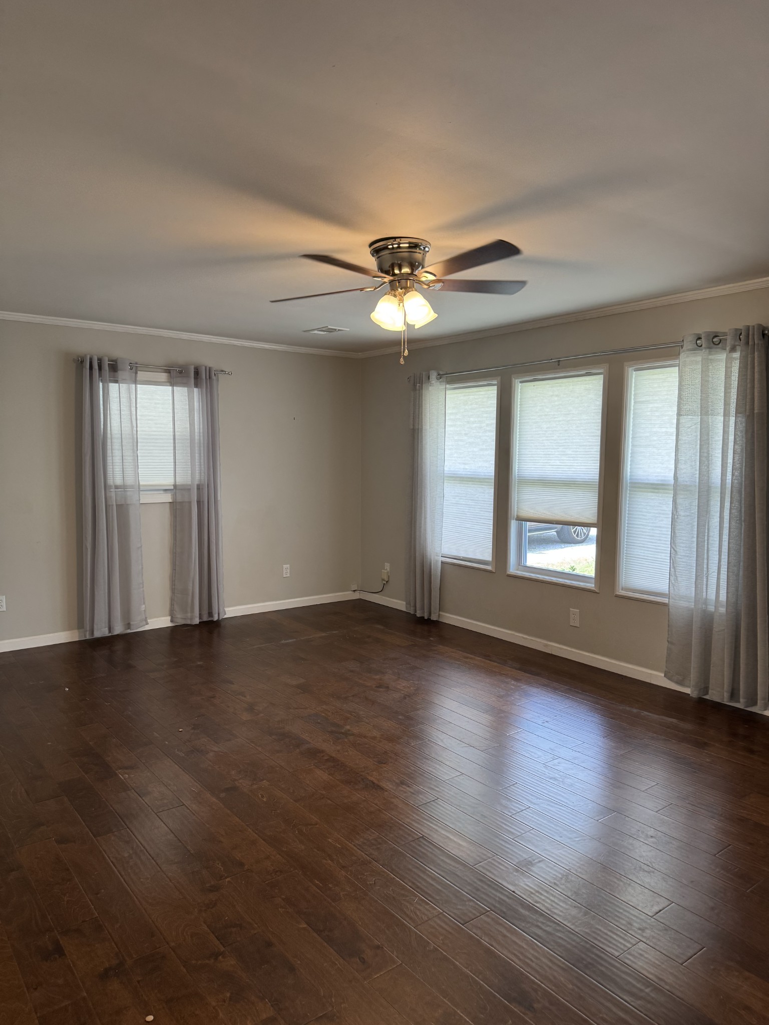 8298 Southfork Road Baxter, TN 38544 - Photo 21 of 49 a view of an empty room with wooden floor and a window