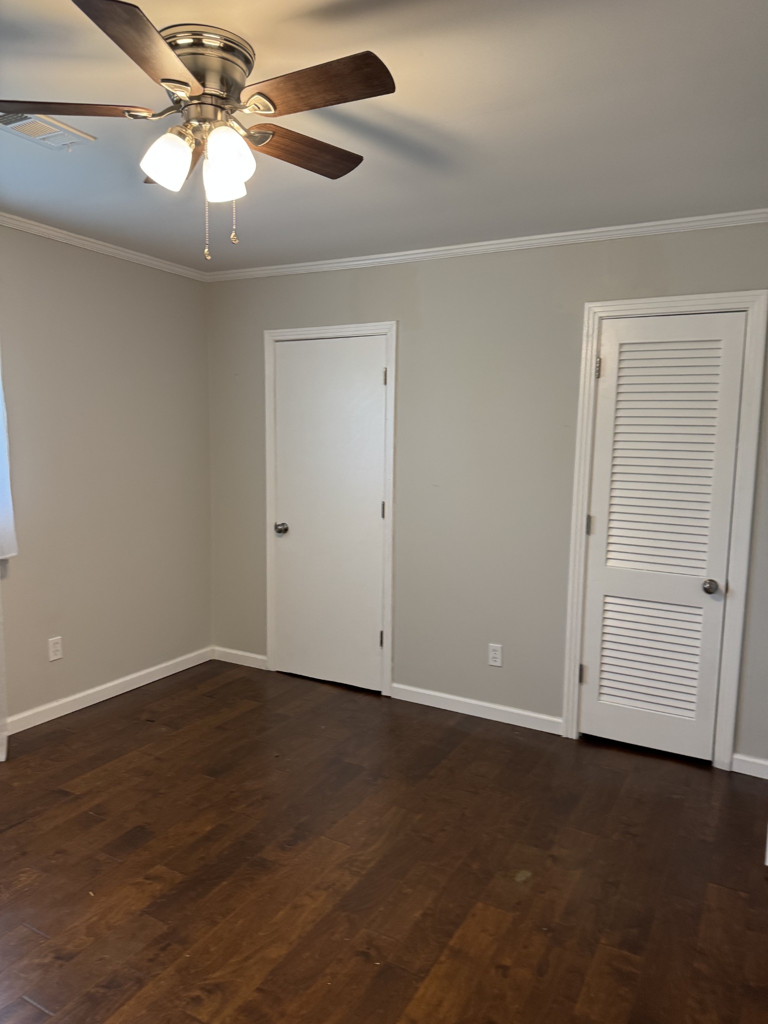 8298 Southfork Road Baxter, TN 38544 - Photo 25 of 49 an empty room with a fan and a ceiling fan