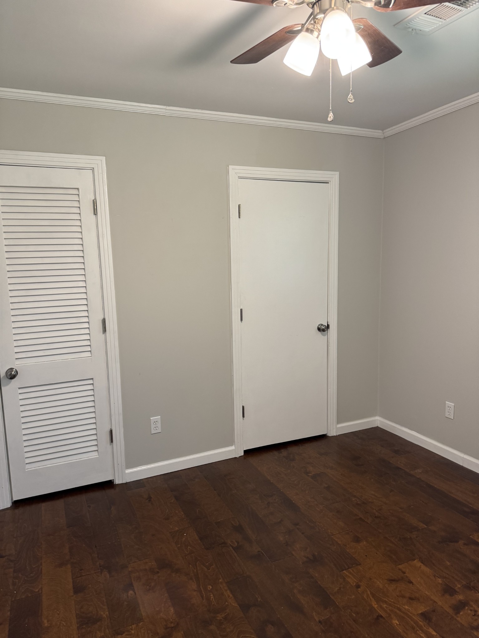 8298 Southfork Road Baxter, TN 38544 - Photo 27 of 49 an empty room with wooden floor closet and windows
