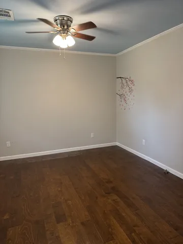a kitchen with granite countertop a stove and a microwave