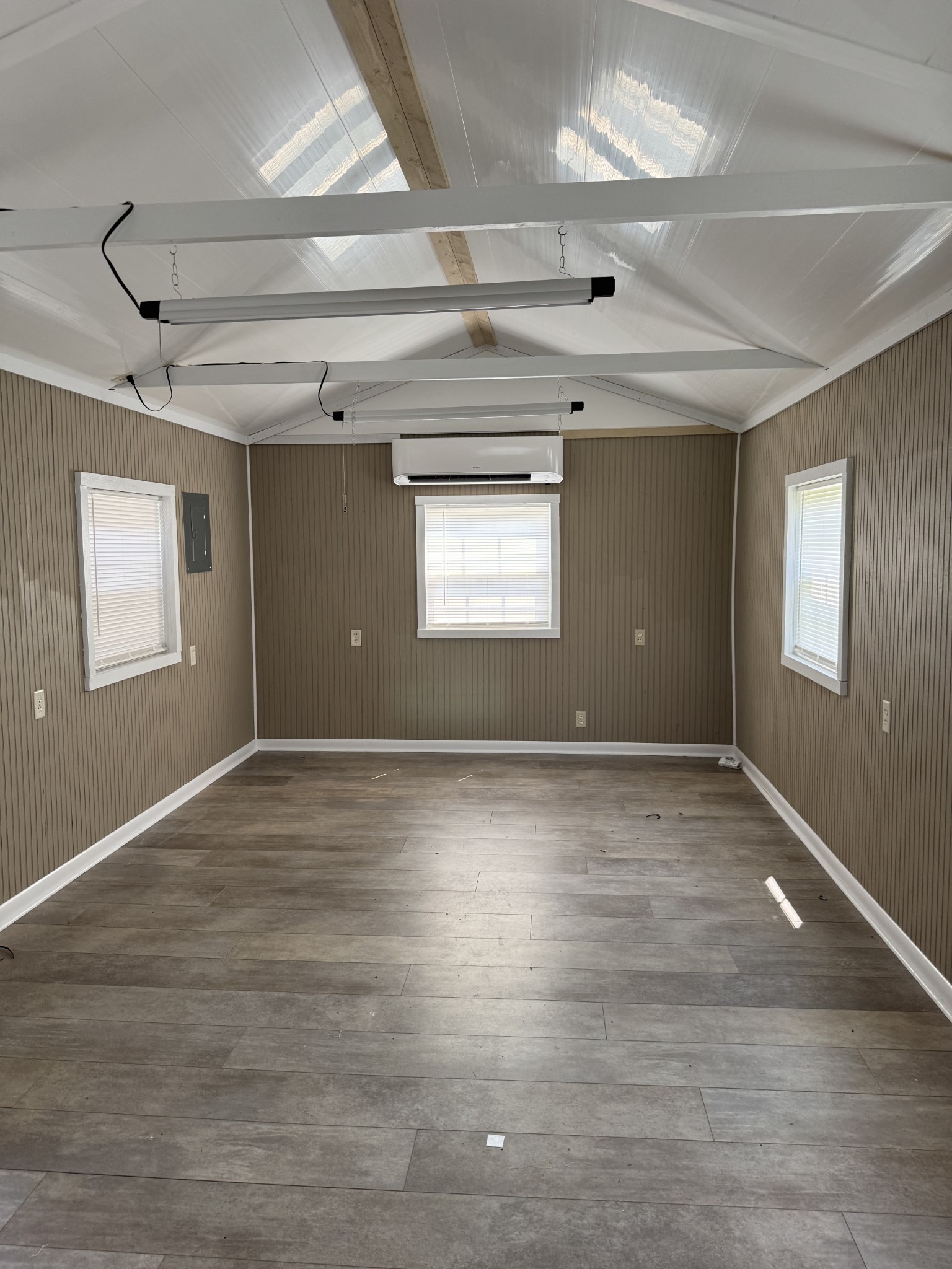 8298 Southfork Road Baxter, TN 38544 - Photo 42 of 49 a view of empty room with wooden floor and fan
