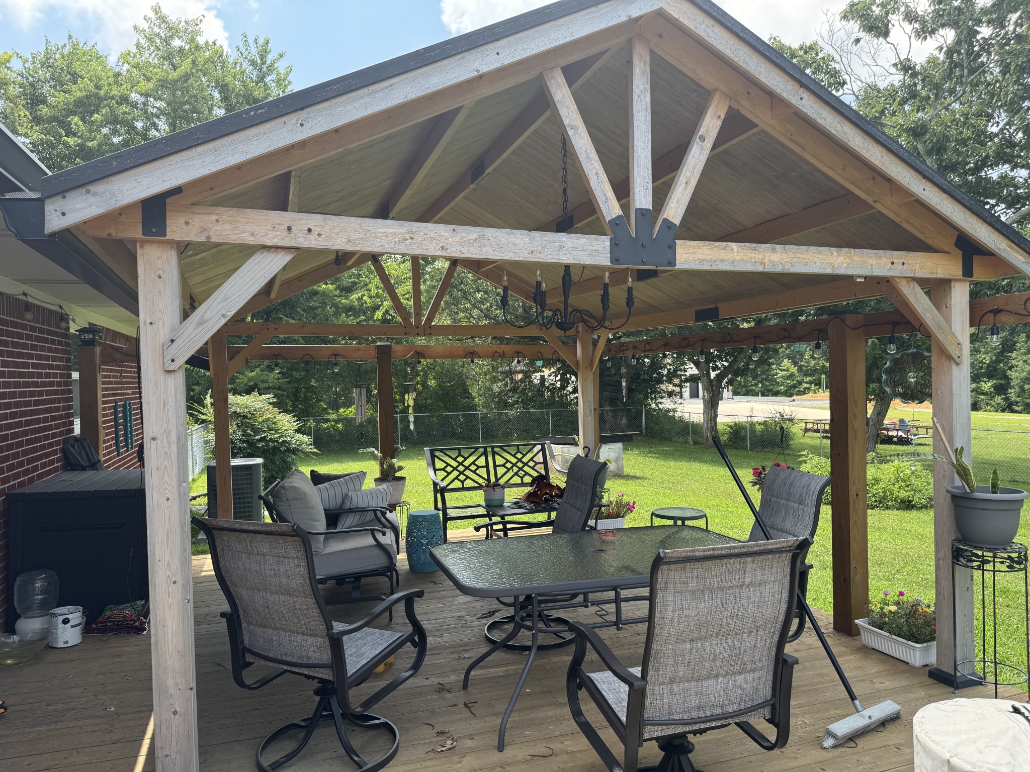 8298 Southfork Road Baxter, TN 38544 - Photo 10 of 49 a view of patio with a table and chairs under an umbrella