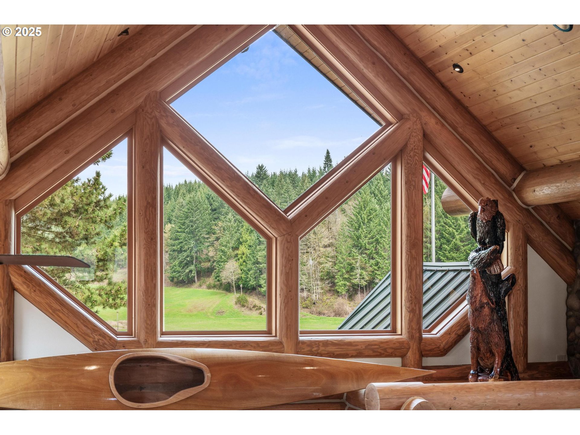 61612 Fays Lane St. Helens, OR 97051 - Photo 15 of 37 a view of a backyard with floor to ceiling window