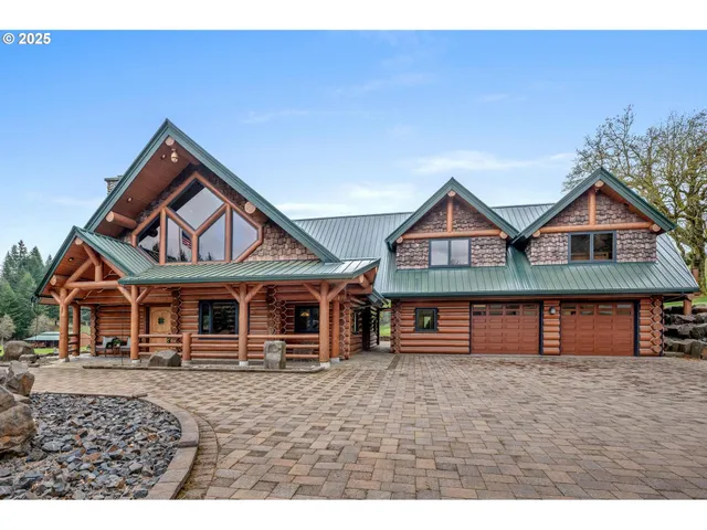 a front view of a house with large windows