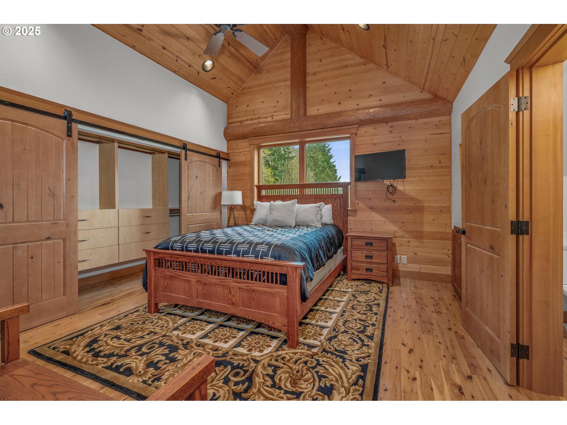 61612 Fays Lane St. Helens, OR 97051 - Photo 25 of 37 a bedroom with a bed and wooden floor