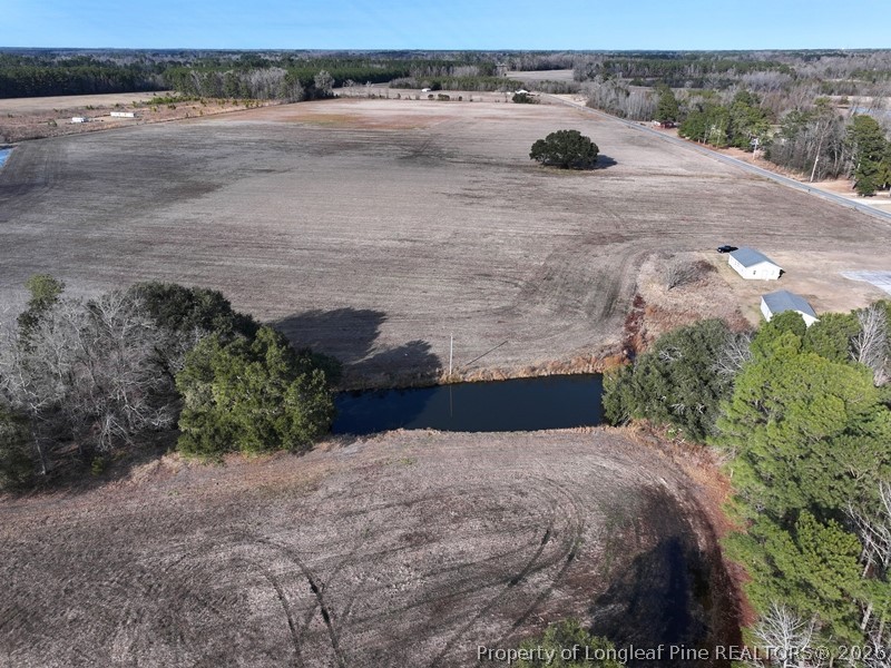 Mckellar Road Fairmont, NC 28340 - Photo 6 of 8 a view of an ocean and a yard